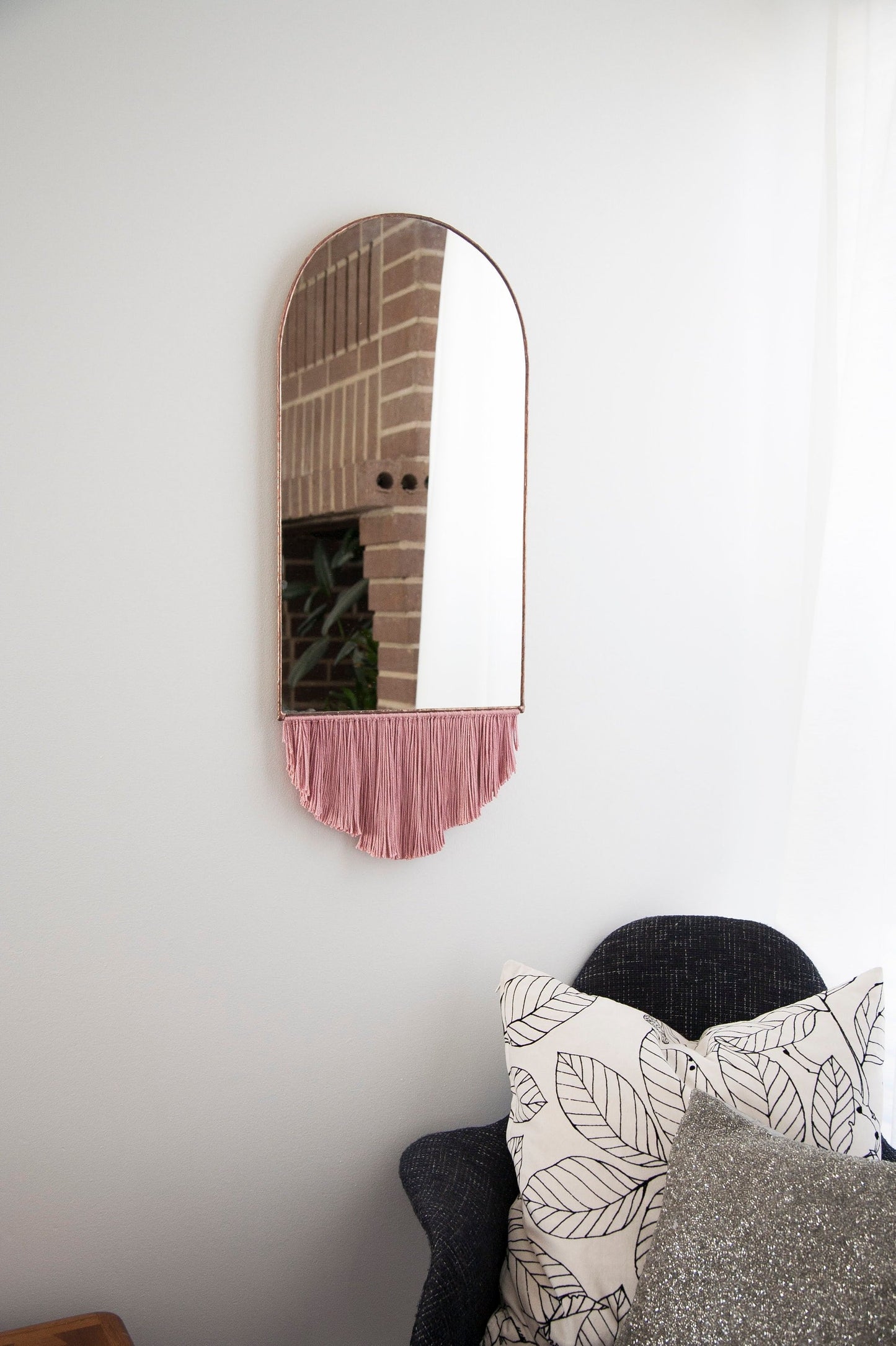 Elongated Arch Mirror with Fringe